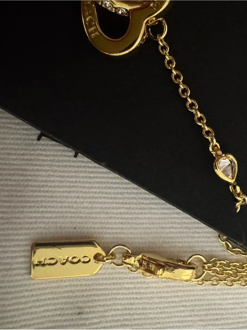 Coach Gold Interlocking Heart Necklace with Crystal Accents